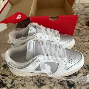 New never worn Nike women’s size 9 dunks white and silver Sneakers